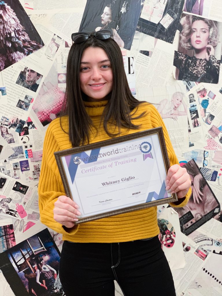 Fashion Stylist Student receiving her certificate of excellence, for completing her fashion styling course.