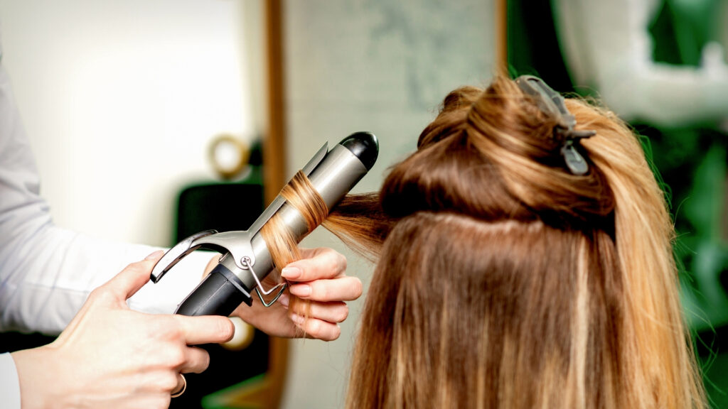 hair being curled with a curling wand